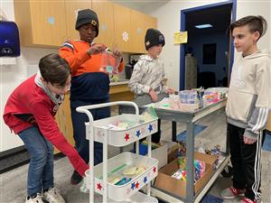  Armstrong school store team makes deliveries